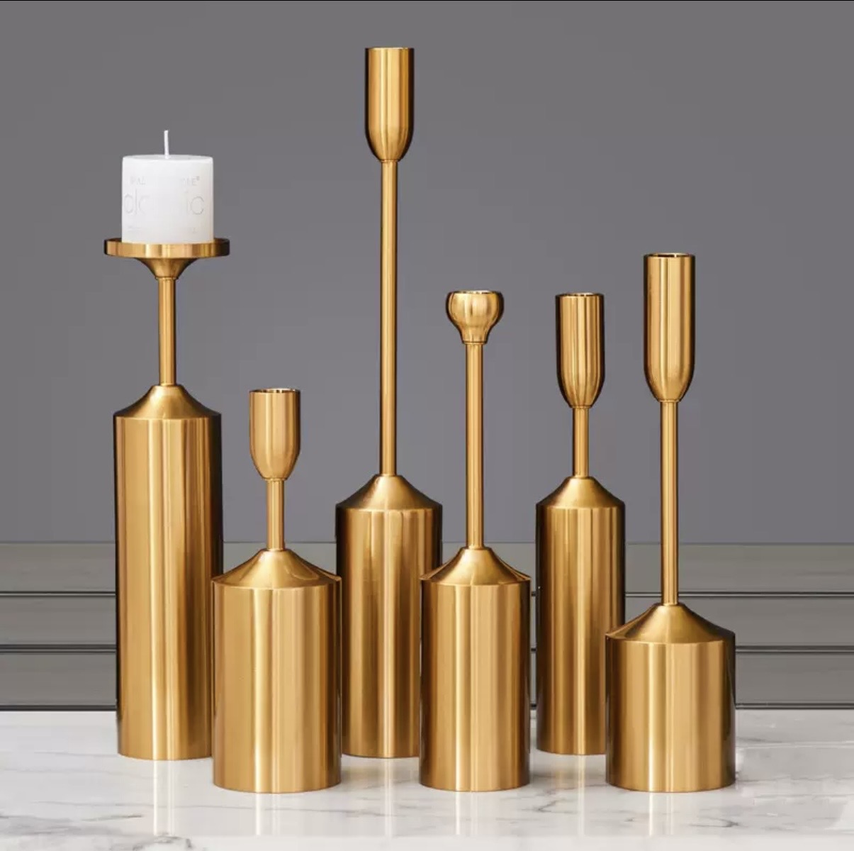 Gold candelabra collection in varied heights